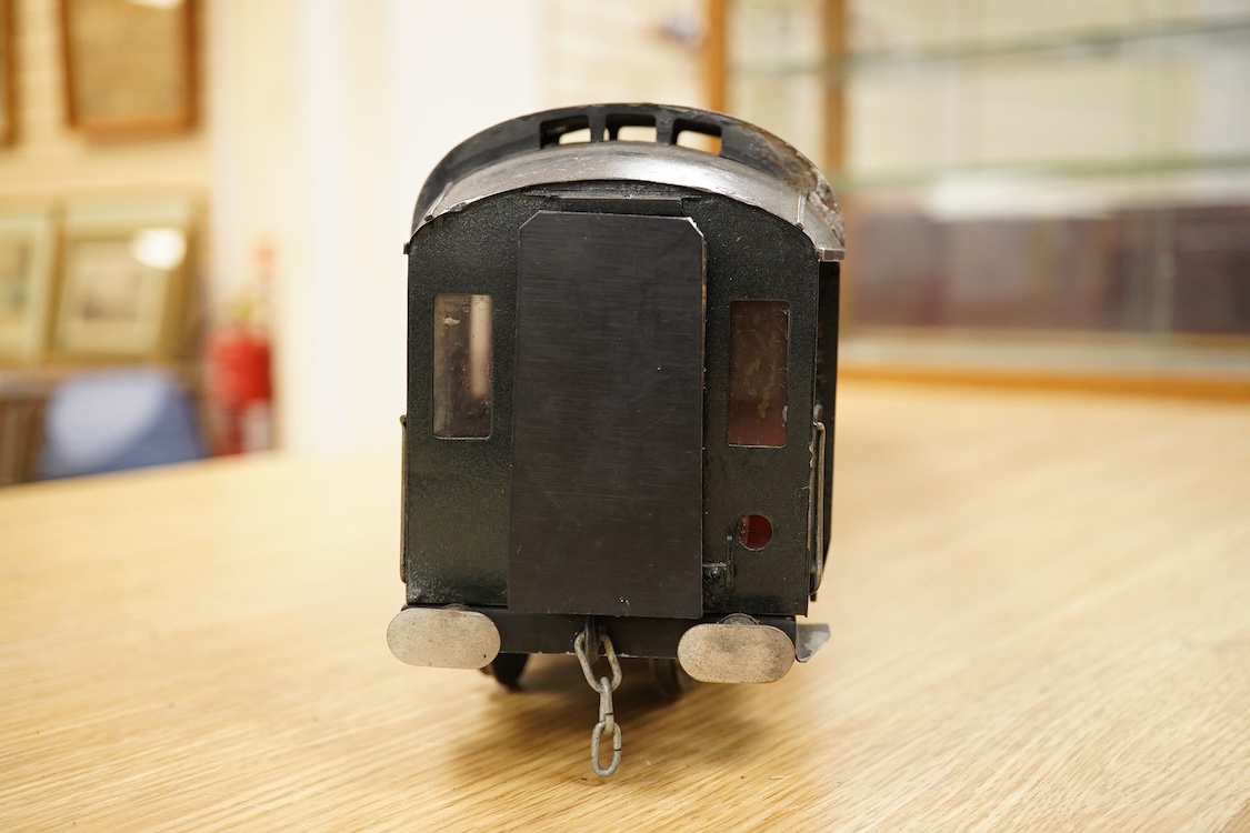 Four Gauge One Continental bogie coaches; two in very dark Green livery, and two ‘Trains Rapides Nord’ in dark green, including some scratch building and possible adaptation from kits
